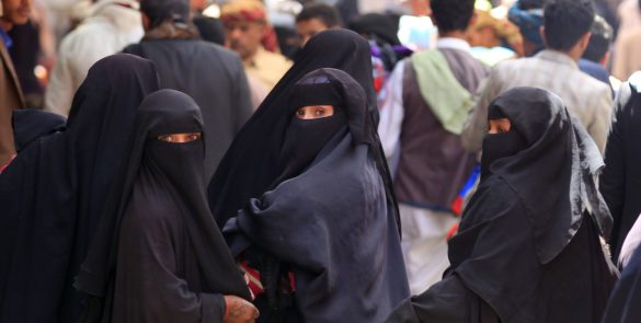(FILES) In this file photo taken on March 02, 2020 Yemeni women walk in the old city market of the Huthi rebels held capital Sanaa. - Experts say repression of women in Yemen is rampant after years of civil war. Yemen has long been a deeply conservative society, but the Iran-backed Huthis are enforcing their austere brand of Islam with an iron-fist, witnesses say. (Photo by MOHAMMED HUWAIS / AFP)